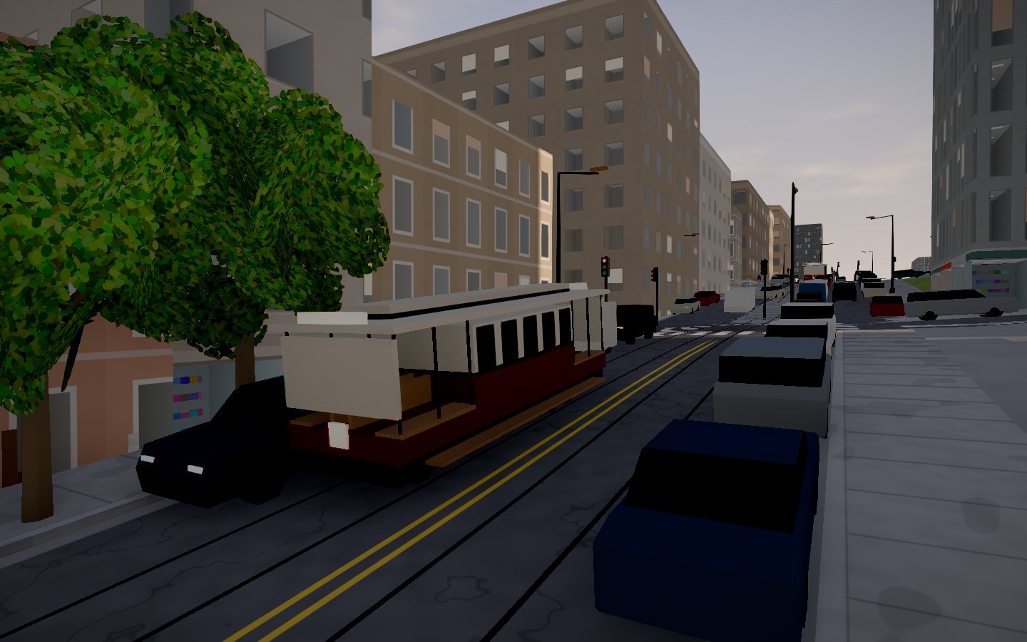A cable car climbing a hill street between parked cars, traffic signals and street lamps